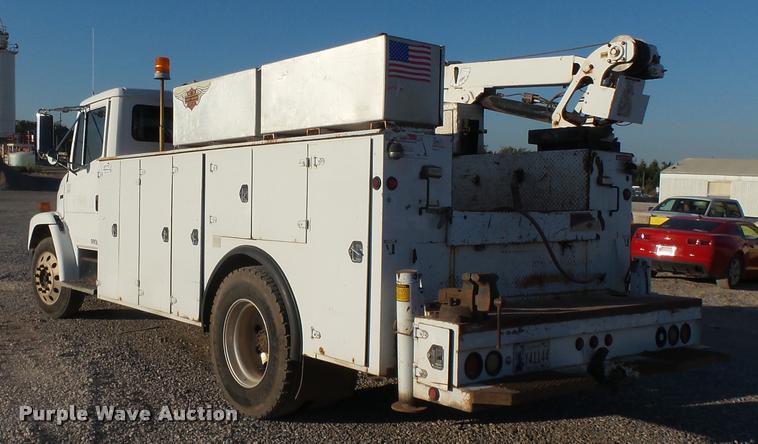 image for item DB0073 2001 Freightliner FL60 service truck with crane