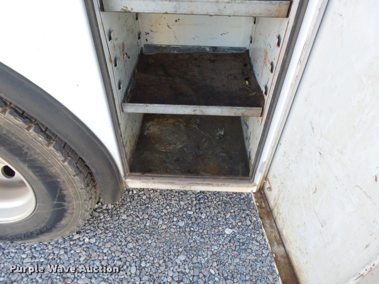 image for item DB0073 2001 Freightliner FL60 service truck with crane