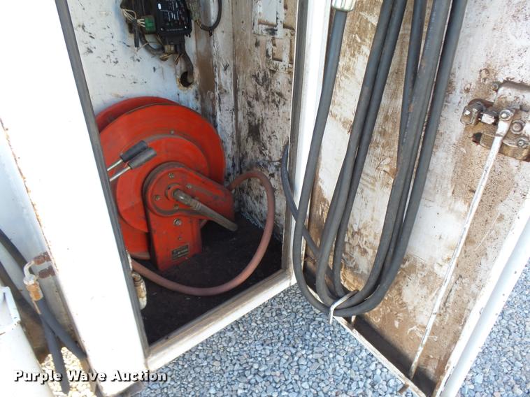 image for item DB0073 2001 Freightliner FL60 service truck with crane