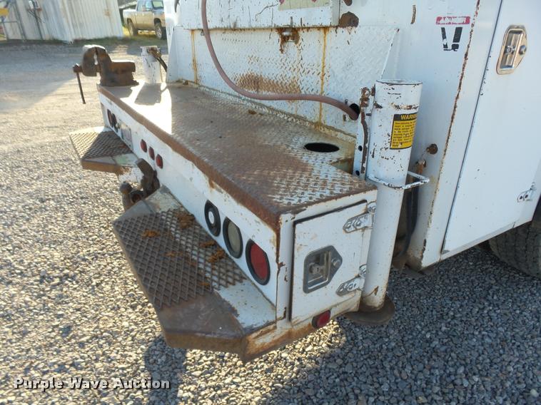 image for item DB0073 2001 Freightliner FL60 service truck with crane