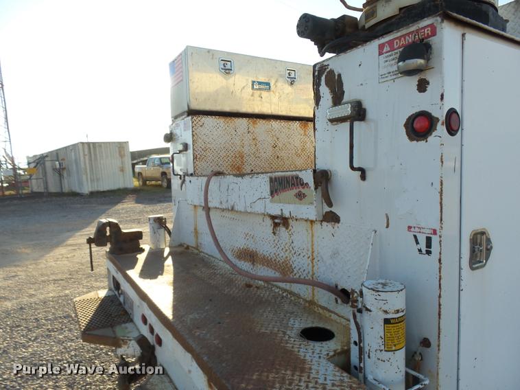 image for item DB0073 2001 Freightliner FL60 service truck with crane