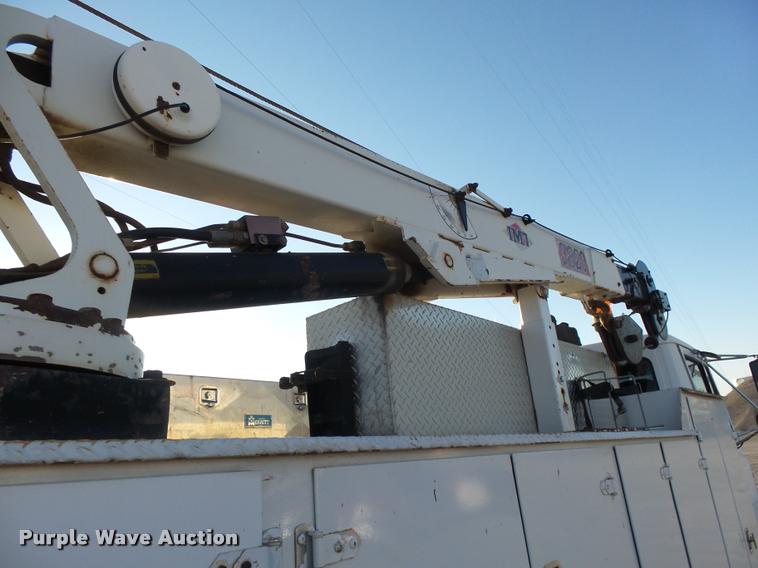 image for item DB0073 2001 Freightliner FL60 service truck with crane