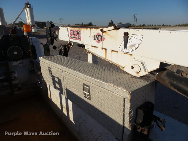 image for item DB0073 2001 Freightliner FL60 service truck with crane