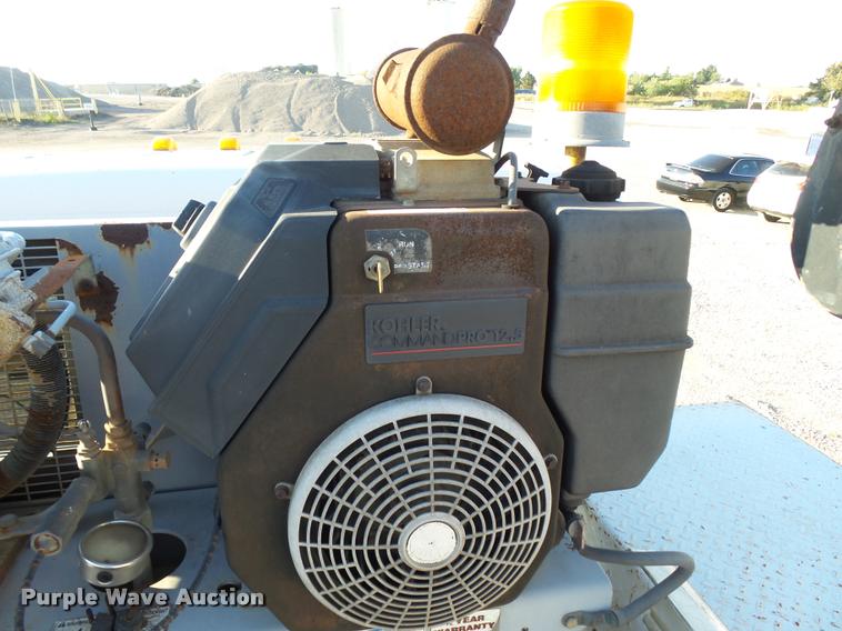 image for item DB0073 2001 Freightliner FL60 service truck with crane