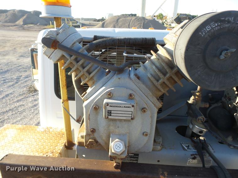 image for item DB0073 2001 Freightliner FL60 service truck with crane