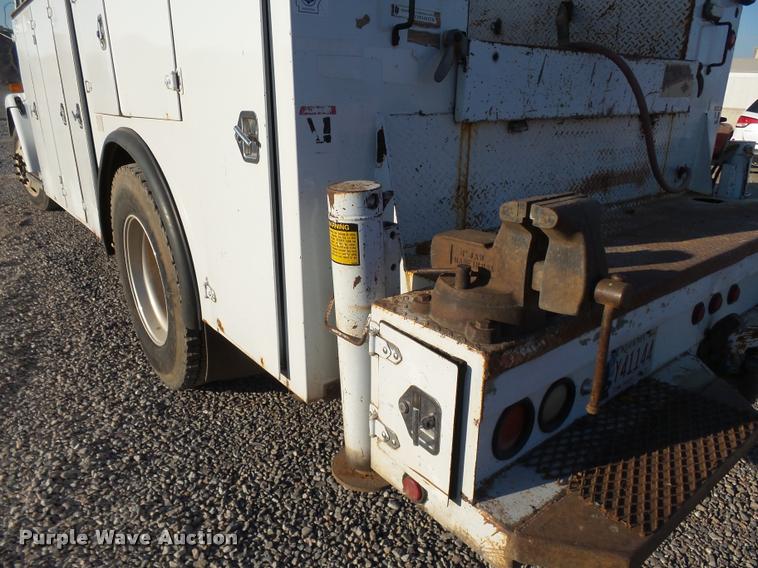 image for item DB0073 2001 Freightliner FL60 service truck with crane