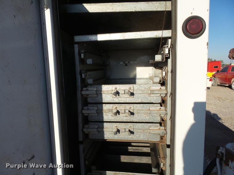 image for item DB0073 2001 Freightliner FL60 service truck with crane