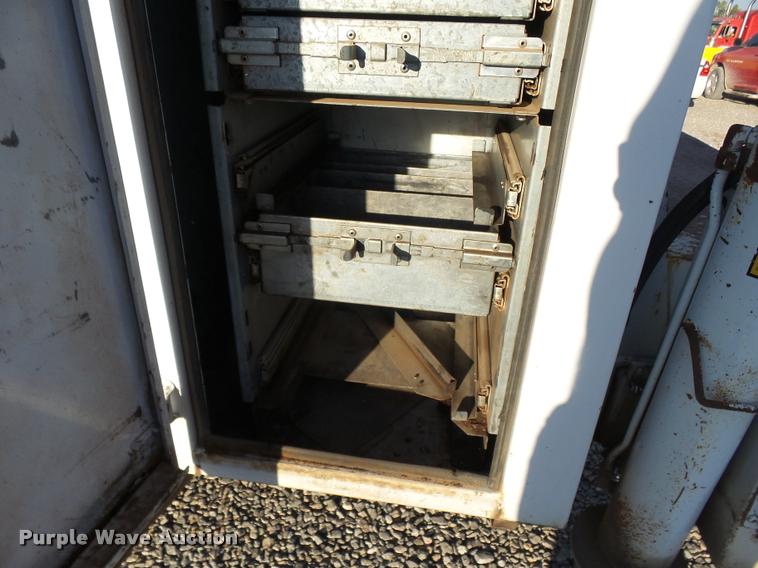 image for item DB0073 2001 Freightliner FL60 service truck with crane