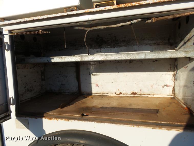 image for item DB0073 2001 Freightliner FL60 service truck with crane