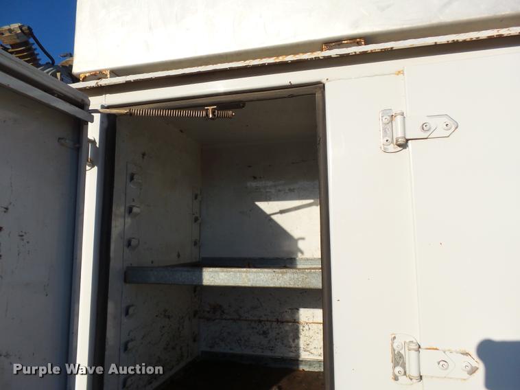 image for item DB0073 2001 Freightliner FL60 service truck with crane