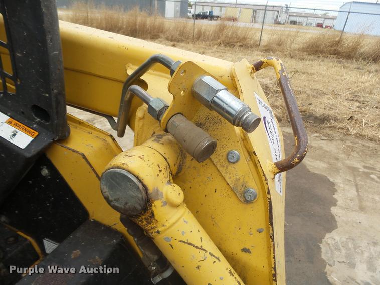 image for item DB1755 2003 John Deere 240 skid steer