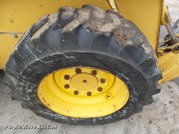 image for item DB1755 2003 John Deere 240 skid steer