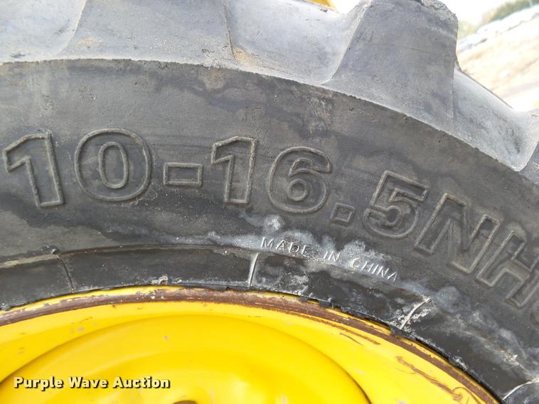 image for item DB1755 2003 John Deere 240 skid steer