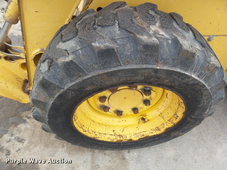 image for item DB1755 2003 John Deere 240 skid steer