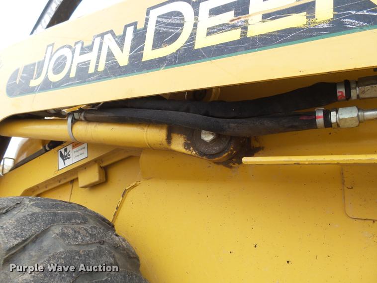 image for item DB1755 2003 John Deere 240 skid steer