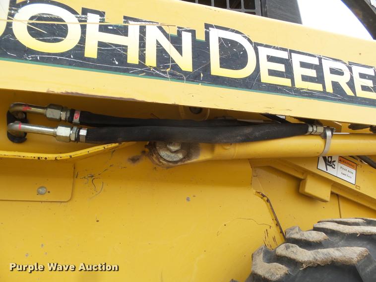 image for item DB1755 2003 John Deere 240 skid steer