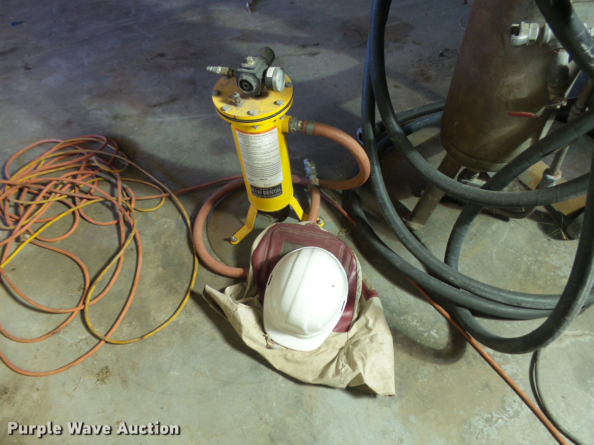 Sandblasting unit with fresh air ventilated hood system in Dodge City