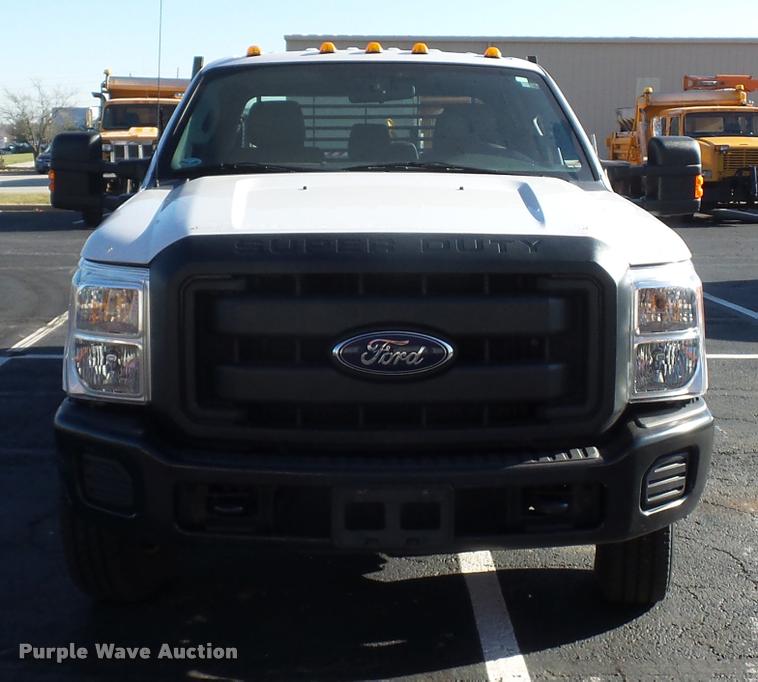 image for item AX9053 2012 Ford F350 Super Duty Crew Cab flatbed pickup truck