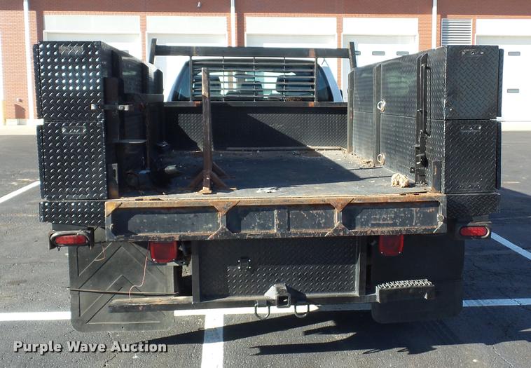 image for item AX9053 2012 Ford F350 Super Duty Crew Cab flatbed pickup truck