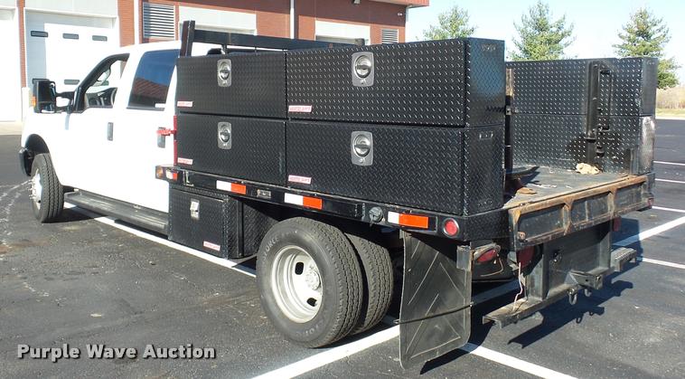 image for item AX9053 2012 Ford F350 Super Duty Crew Cab flatbed pickup truck