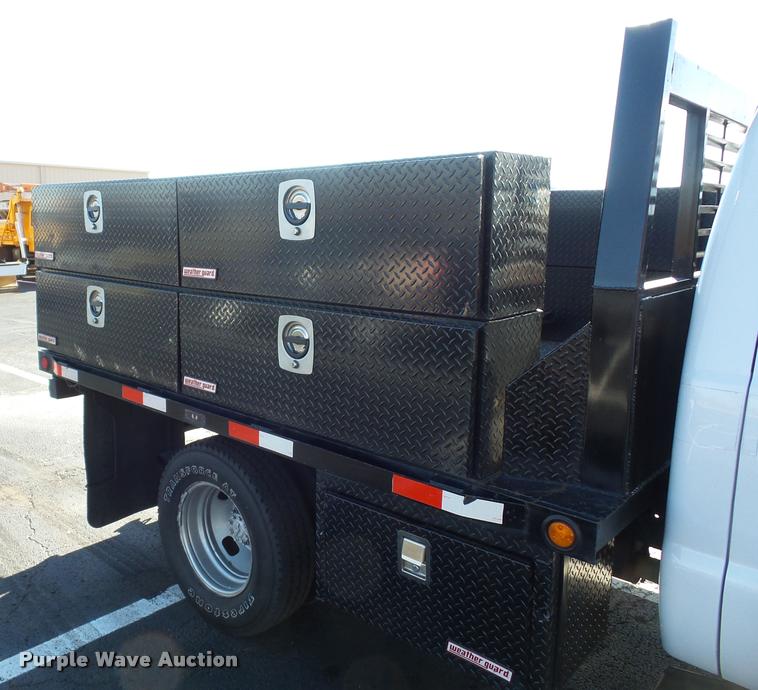 image for item AX9053 2012 Ford F350 Super Duty Crew Cab flatbed pickup truck