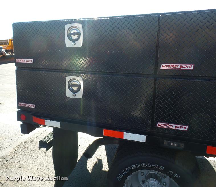 image for item AX9053 2012 Ford F350 Super Duty Crew Cab flatbed pickup truck