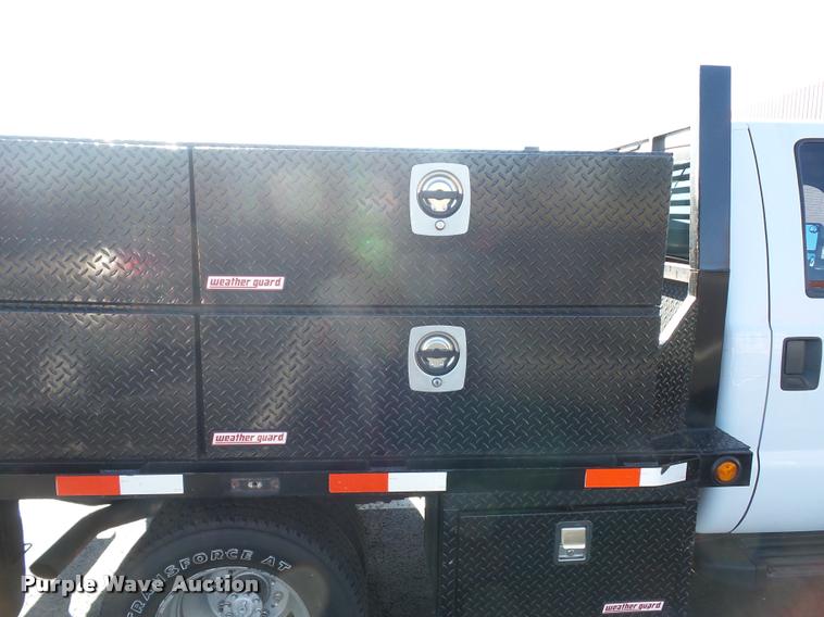 image for item AX9053 2012 Ford F350 Super Duty Crew Cab flatbed pickup truck