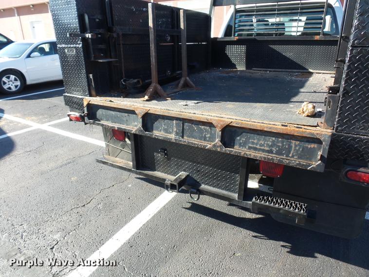 image for item AX9053 2012 Ford F350 Super Duty Crew Cab flatbed pickup truck