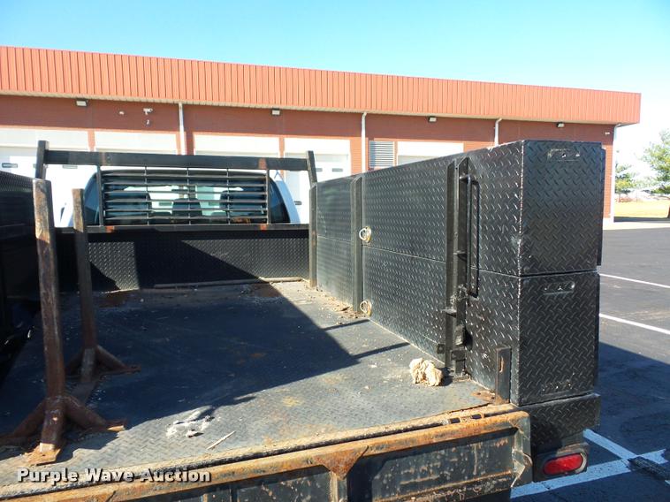 image for item AX9053 2012 Ford F350 Super Duty Crew Cab flatbed pickup truck