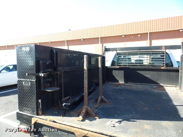 image for item AX9053 2012 Ford F350 Super Duty Crew Cab flatbed pickup truck