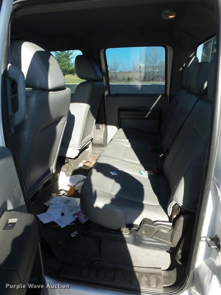 image for item AX9053 2012 Ford F350 Super Duty Crew Cab flatbed pickup truck