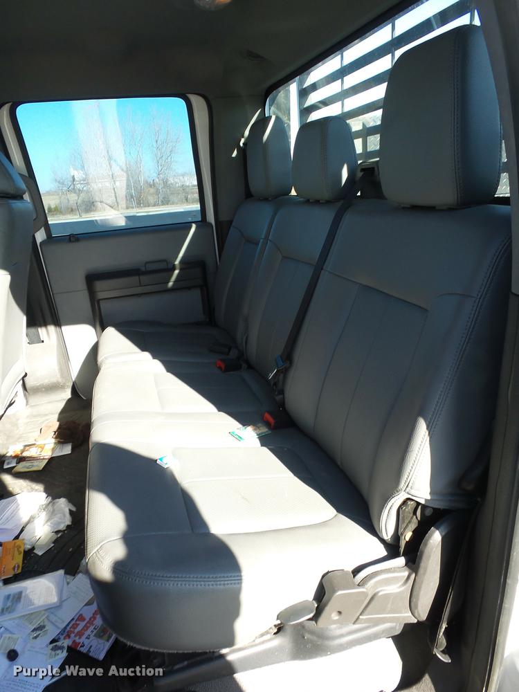 image for item AX9053 2012 Ford F350 Super Duty Crew Cab flatbed pickup truck