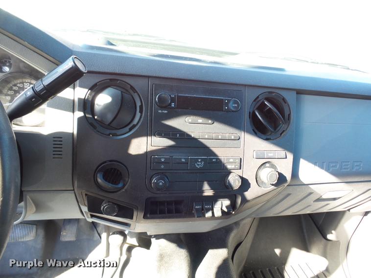 image for item AX9053 2012 Ford F350 Super Duty Crew Cab flatbed pickup truck