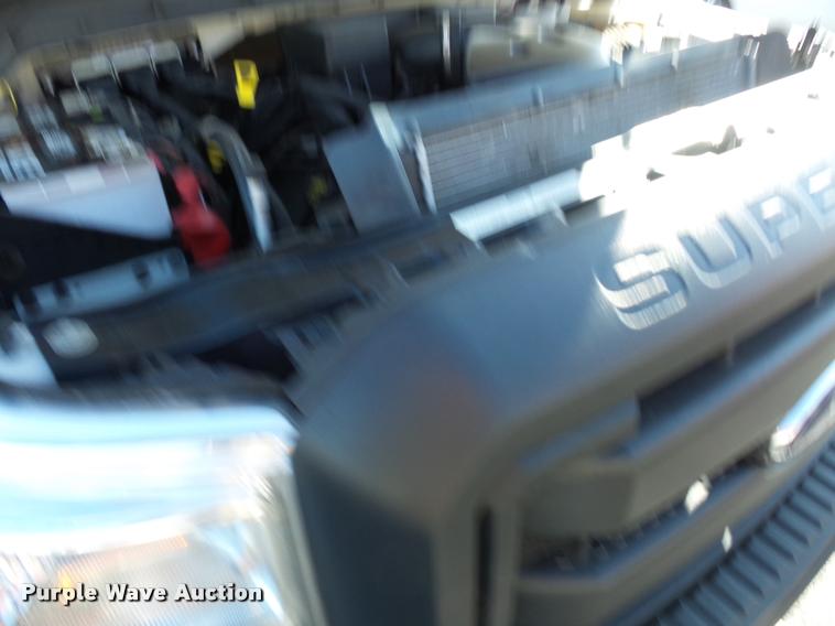 image for item AX9053 2012 Ford F350 Super Duty Crew Cab flatbed pickup truck