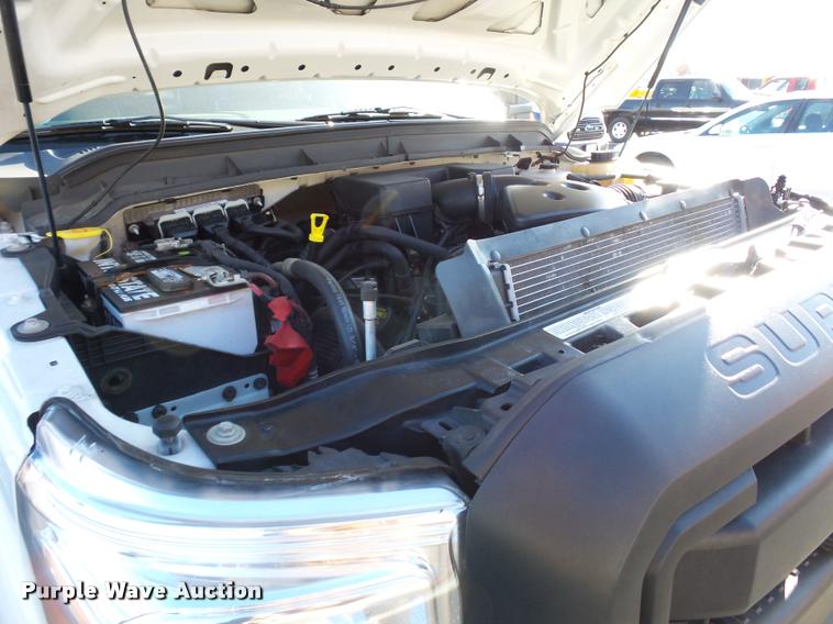 image for item AX9053 2012 Ford F350 Super Duty Crew Cab flatbed pickup truck