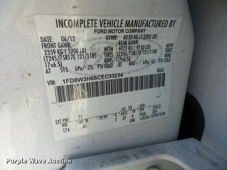 image for item AX9053 2012 Ford F350 Super Duty Crew Cab flatbed pickup truck