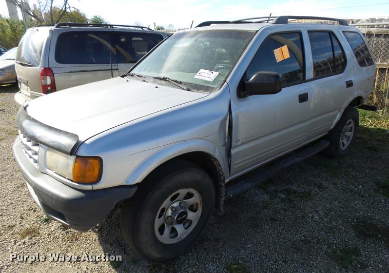 1999 Isuzu Rodeo SUV in McPherson, KS | Item DA2071 sold | Purple Wave