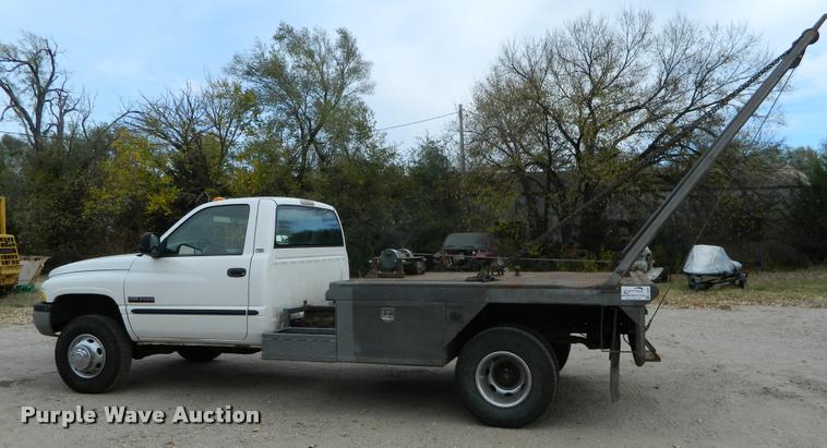 image for item J5055 2002 Dodge Ram 3500 flatbed pickup truck