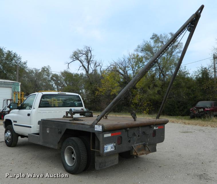 image for item J5055 2002 Dodge Ram 3500 flatbed pickup truck