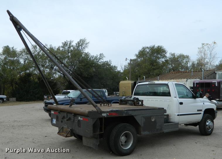 image for item J5055 2002 Dodge Ram 3500 flatbed pickup truck