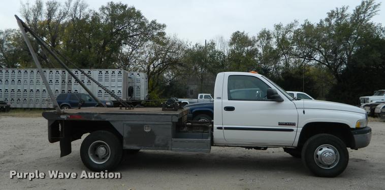 image for item J5055 2002 Dodge Ram 3500 flatbed pickup truck
