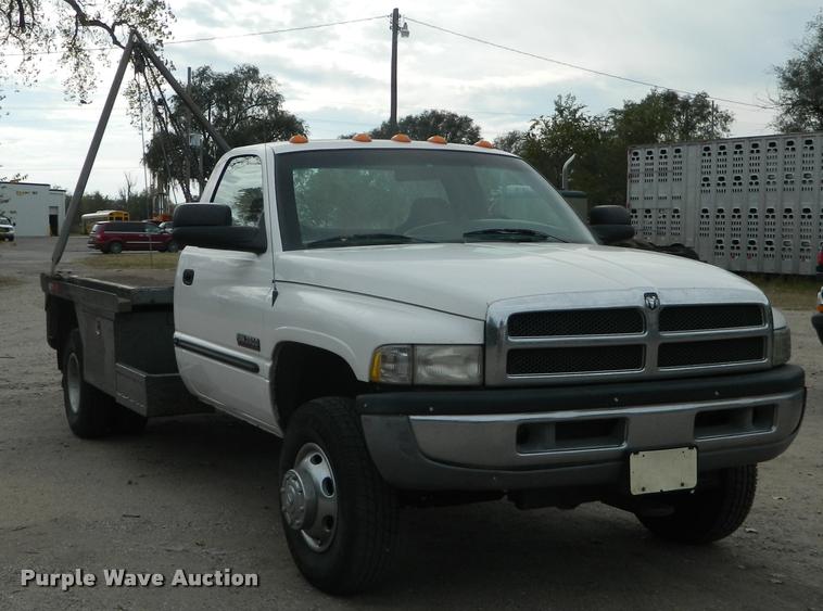 image for item J5055 2002 Dodge Ram 3500 flatbed pickup truck