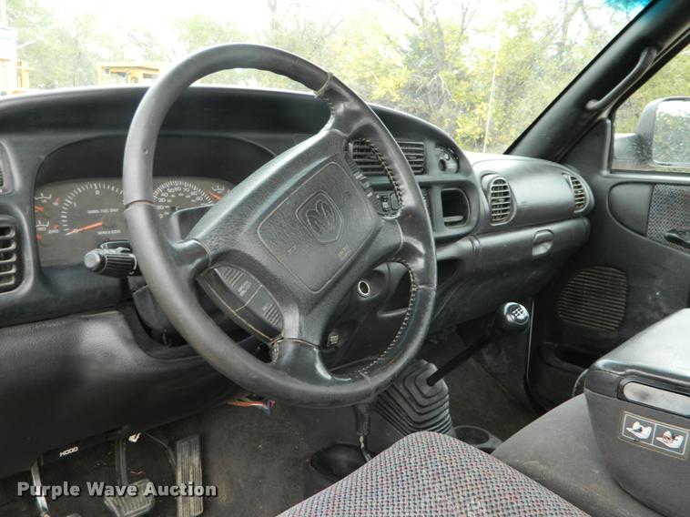 image for item J5055 2002 Dodge Ram 3500 flatbed pickup truck