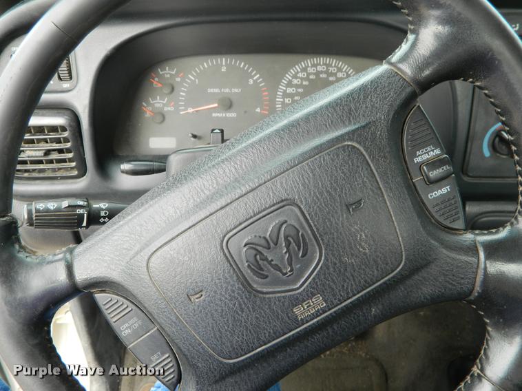 image for item J5055 2002 Dodge Ram 3500 flatbed pickup truck