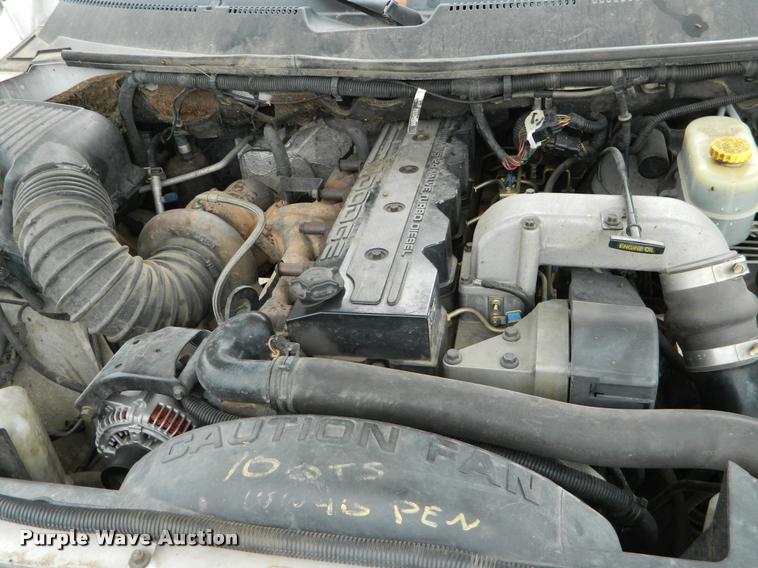 image for item J5055 2002 Dodge Ram 3500 flatbed pickup truck