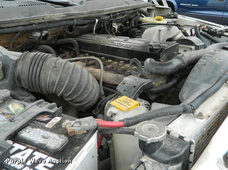 image for item J5055 2002 Dodge Ram 3500 flatbed pickup truck