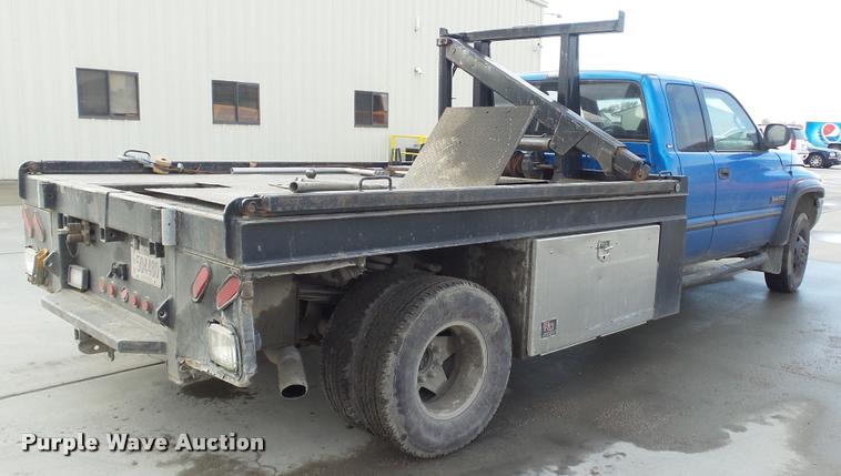 image for item J5725 2001 Dodge Ram 2500 Laramie SLT Quad Cab flatbed pickup truck