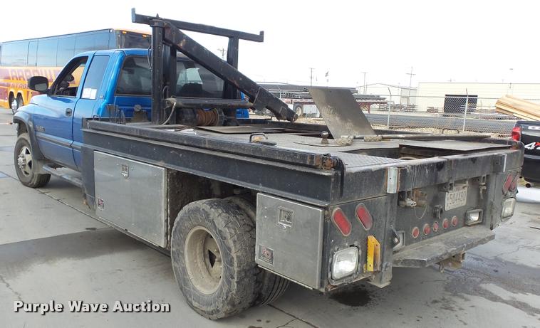 image for item J5725 2001 Dodge Ram 2500 Laramie SLT Quad Cab flatbed pickup truck