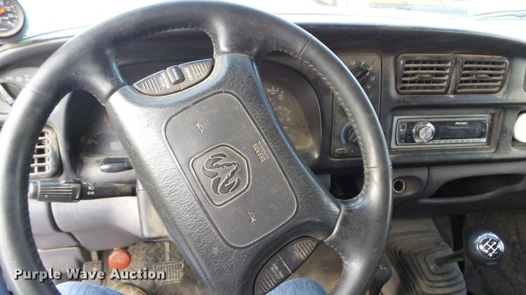 image for item J5725 2001 Dodge Ram 2500 Laramie SLT Quad Cab flatbed pickup truck