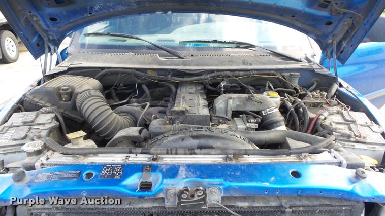 image for item J5725 2001 Dodge Ram 2500 Laramie SLT Quad Cab flatbed pickup truck